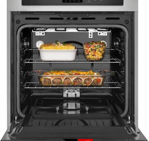 Black glass built-in oven with touch controls in a stylish kitchen. FYIRWA TRADING LTD